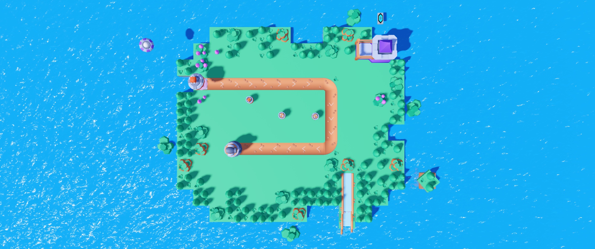 Top-down view of the island level: the road loop, the towers, the castle core and a waterfall.